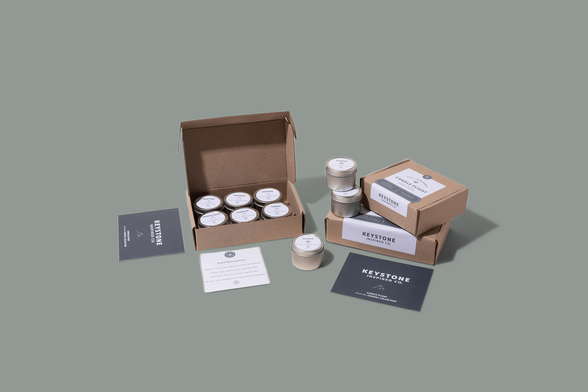 Collection of flights products including boxes, containers, and cards on a gray background