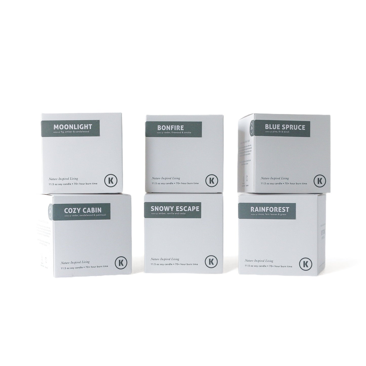Set of six boxes labeled with different scents on a white background